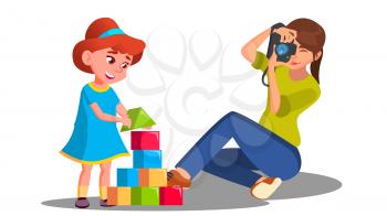 Mother Taking Pictures Of Her Child Playing With Toys Vector. Illustration