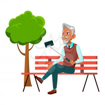 Old Man Making Selfie On Phone In Park Vector. Hispanic Pensioner Guy Holding Selfie Stick With Smartphone For Make Photo On Cellphone Camera. Character Enjoying Outside Flat Cartoon Illustration