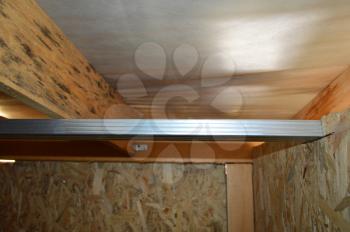 Plasterboard installation on the ceiling and wall