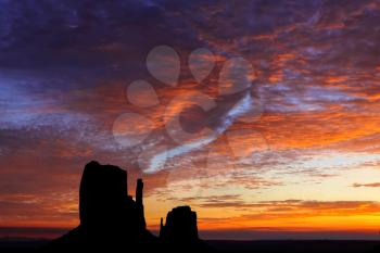 Blazing Sunrise over the Mittens in Monument Valley