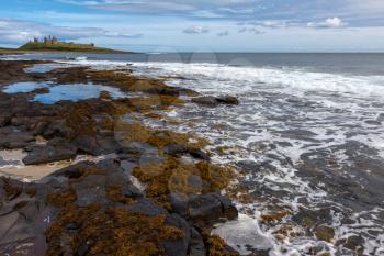View of Dunstanburgh Castle at Craster Northumberland