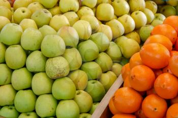 Close-up of Apples and Oranges on a Stall in Funchal Covered Market