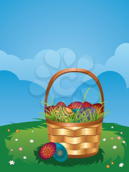 Wicker Easter basket with colorful eggs on green lawn.