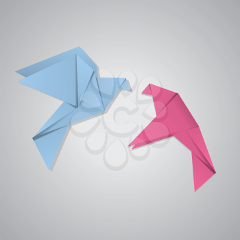 Pink and blue origami pigeons on grey background.