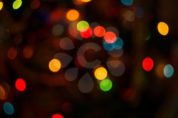 Abstract circular bokeh blurred color light texture as background.