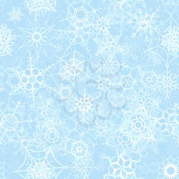 A lot of frozen snowflakes on ice background, winter seamless pattern