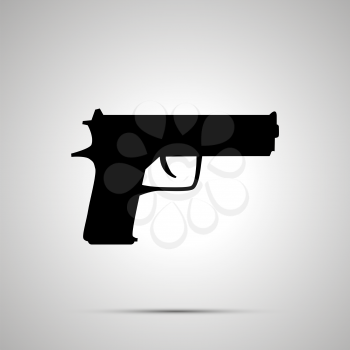 Gun silhouette, simple black icon with shadow