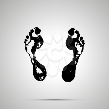 Imprints of bare human foots, simple black icon with shadow