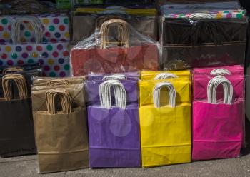 One simple color paper shopping bag in the market place