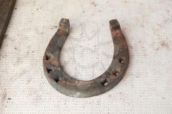 Lucky  horse shoe made of metal with nail holes