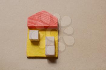 House from wooden blocks as concept of buying, selling, renting real estate, building and  eco style