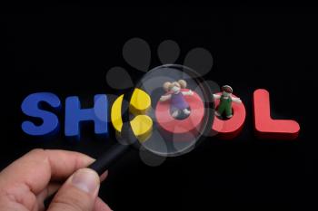Education concept by School lettering  with colorful wooden letters