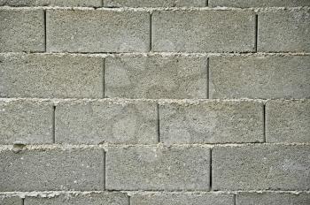 Cinder block rough wall texture background pattern.