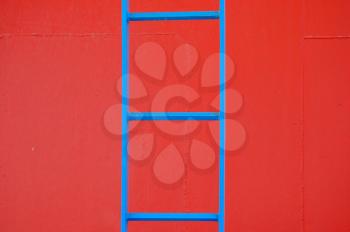 Metal ladder on a ferry boat. Abstract geometric background.