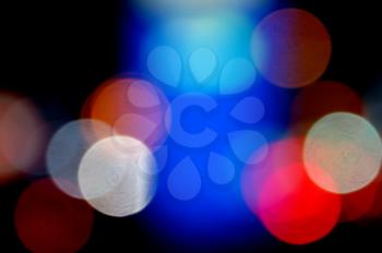 Defocused colorful light dots. Abstract background.