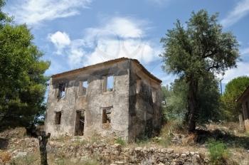 Traditional rural house in Zakynthos abandoned after a severe earthquake in 1953.