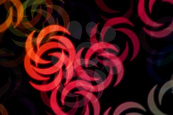 Abstract swirl shapes colorful orbs blur party background.