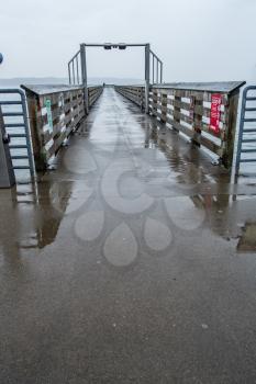 A view of the pier at Dash Point, Washington on a rainy day.
