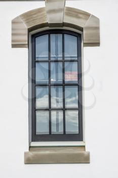 A view of a tall double window.