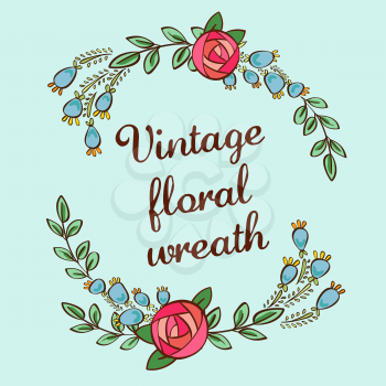 vintage wreath on a blue background with roses and blue berries