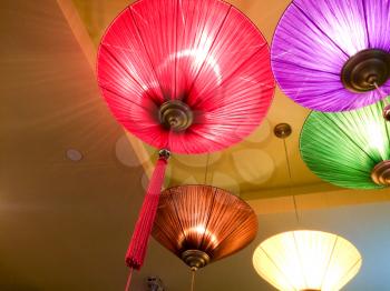 Asian chinese japanese lanterns celebrate in red green purple gold