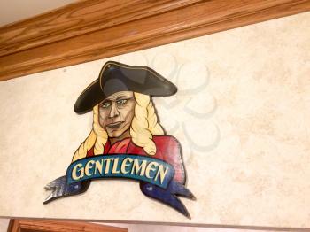 Pirate themed party restroom signs for ladies and gentlemen
