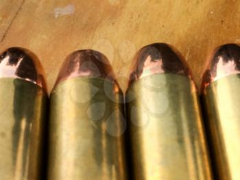 Bullets 40 .40 caliber smith and wesson winchester brass for handgun firearm close up
