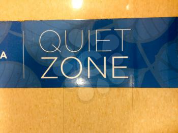 be quiet zone sign in white letters and blue background