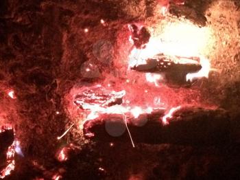 firewood logs burning bonfire pit bright hot flames