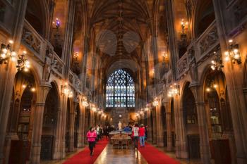 Manchester, UK: 20 October 2019: People visitig The John Rylands Library Historic Reading Room