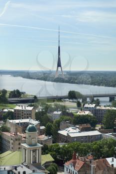 Riga tv tower on a bright sunny day with the city