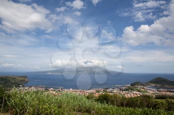 Mountain of PIco with clouds forming around its peak, a view from Faial, Azores, Portugal