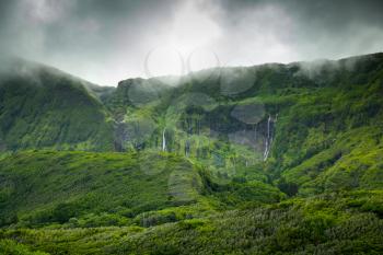 Lush green foggy landscape of Flores Island, Azores, Portugal