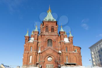 Helsinki, Finland - 20 January 2019: Uspenski Cathedral with clear blue sky on the background