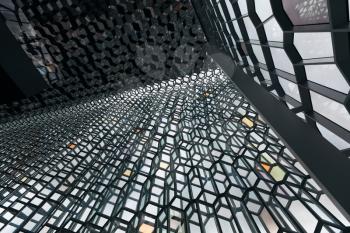 Reykjavik, Iceland - 17 June 2014: Interior of Harpa concert hall showing its ceiling and walls imitating a glaciar