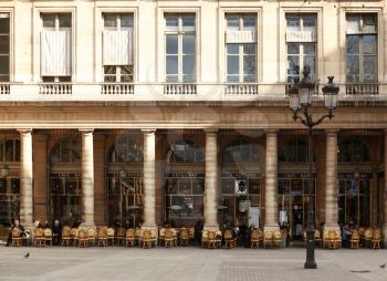 PARIS, FRANCE, MARCH 04 2015:  Cafe le Nemours, perfect place for people watching in Paris.  Classical place in Paris located near the comedie francaise and the Louvre.