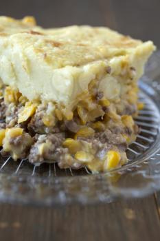 Shepherds pie or canadian pate chinois mash potatoes with meat and corn in a clear plate