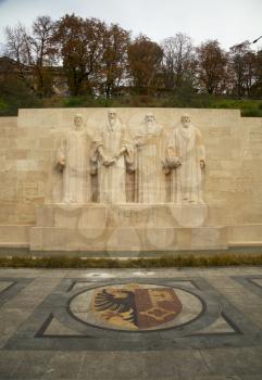 GENEVA-SWITZERLAND OCTOBER 25, 2015:  The International Monument to the Reformation in Geneva, Switzerland honor many of the main individuals, events, and documents of the Protestant Reformation by depicting them in statues and bas-reliefs.