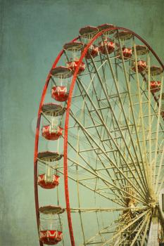 Vintage retro red ferris wheel.  Cross processed to look like and instant picture with texture. instagram style