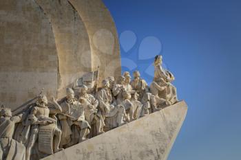 LISBON-PORTUGAL NOVEMBER 8, 2015:  Detail of the right side of the Monument to the Discoveries in Lisbon, Portugal.  Inaugurated in 1960 for the 500th anniversary of Henry the navigator, important figure of 15th-century.
