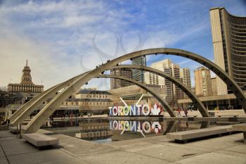 TORONTO CANADA APRIL 13, 2017: Colourful Toronto sign at Nathan Phillips square in Toronto, Canada.  The Square is used regularly for art exhibits, concerts, rallies and other ceremonies.