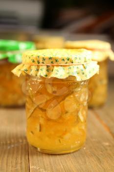 Citrus homemade marmalade with yellow material on top
