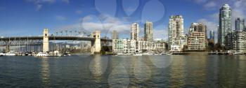 Panorama of Burrard bridge and buildings in Vancouver by a nice sunny day