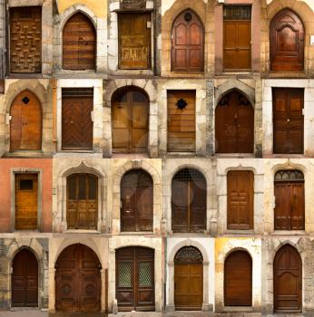 A collage of 24 wooden doors of Annecy in France.