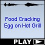 Food Cracking Egg on Hot Grill