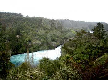 Royalty Free Photo of a Rushing River and Woods