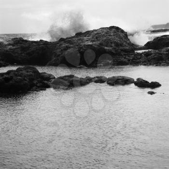 Royalty Free Photo of Landscape of Waves Crashing into a Rocky Maui Hawaii Coast