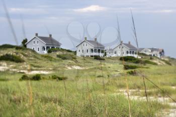 Scenic houses at coast of Bald Head Island, North Carolina.