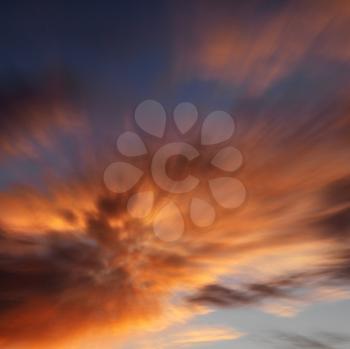 Royalty Free Photo of Orange Clouds in the Sky With a Sunset