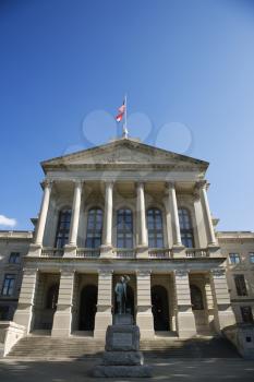 Royalty Free Photo of the Georgia State Capitol Building With Statue of Thomas Watson in Atlanta, Georgia